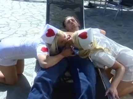 Blond nurses take care of dying patient